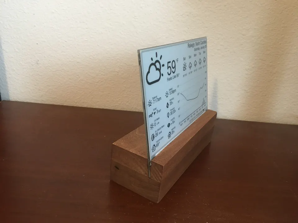 Side view of the assembled display revealing the slim profile of the E-Paper panel and wooden enclosure.